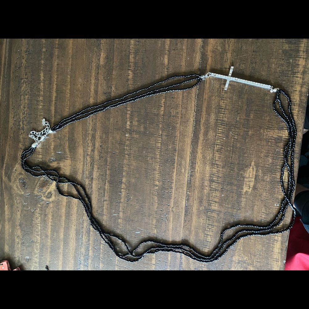 Long black beaded cross necklace